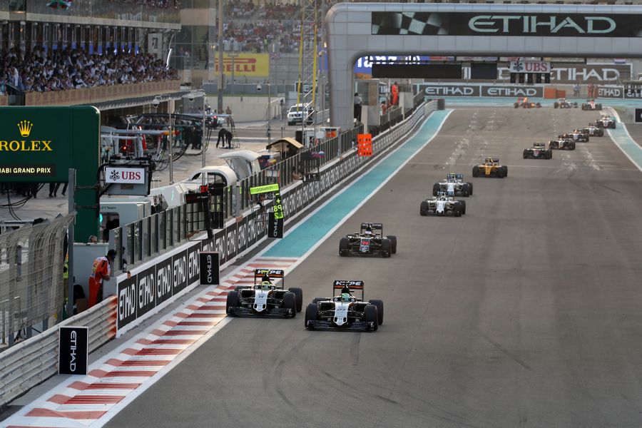 Sergio Perez and Nico Hulkenberg battle for a position in early stage