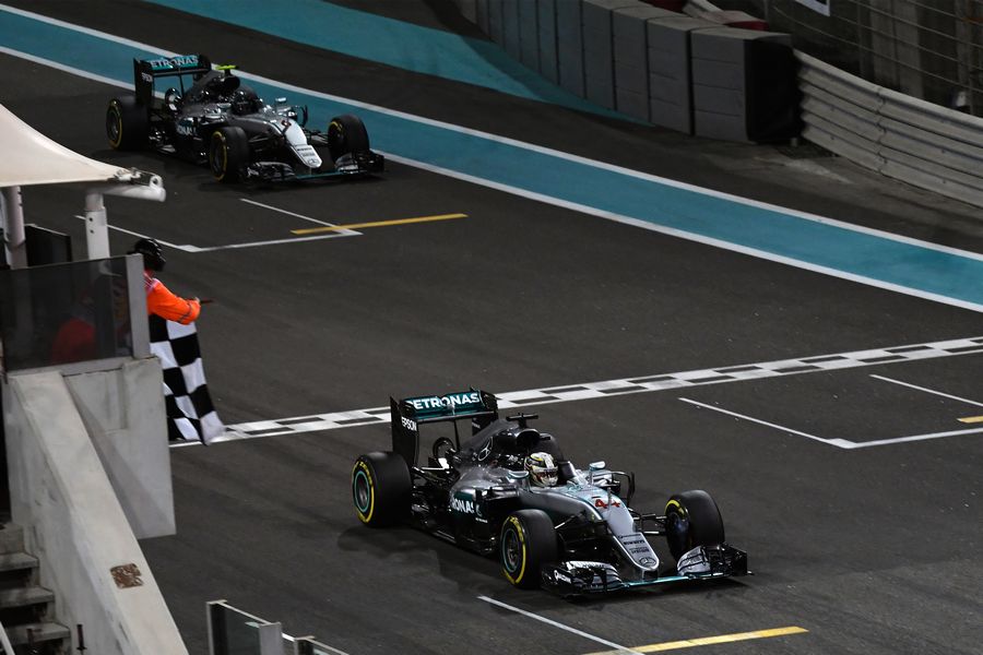 Lewis Hamilton takes the chequered flag