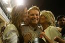 World Champion Nico Rosberg celebrates with wife his Mother