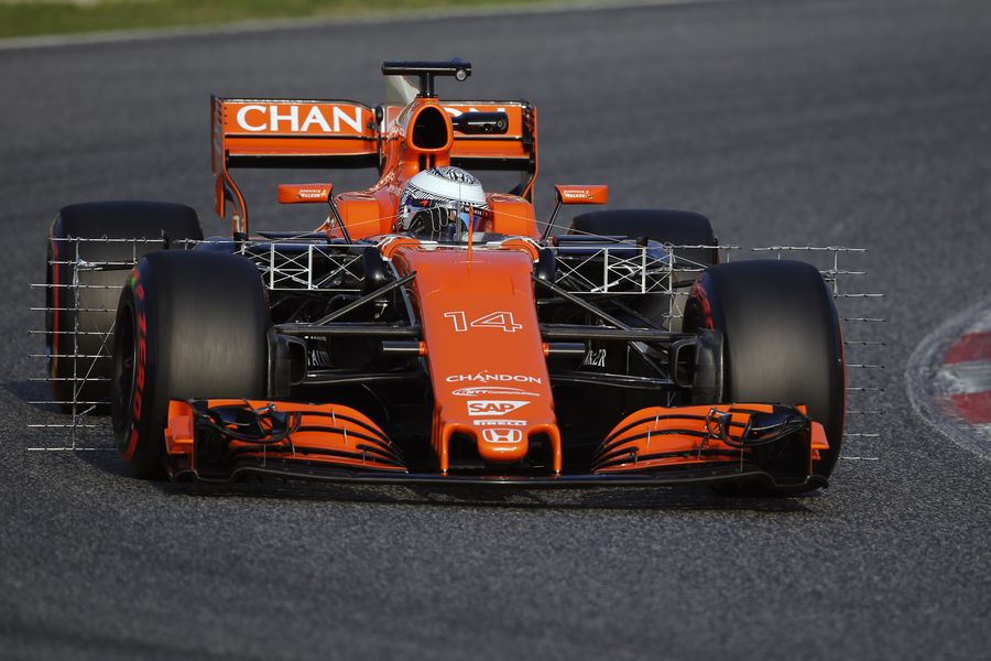 Fernando Alonso turns into the apex in the McLaren MCL32 with aero sensors