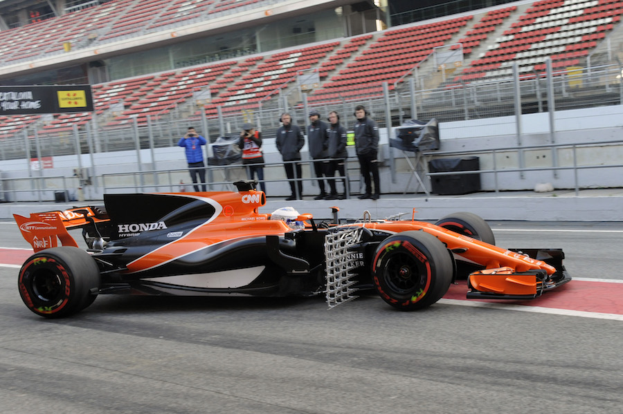 Fernando Alonso leaves the pit with aero sensors