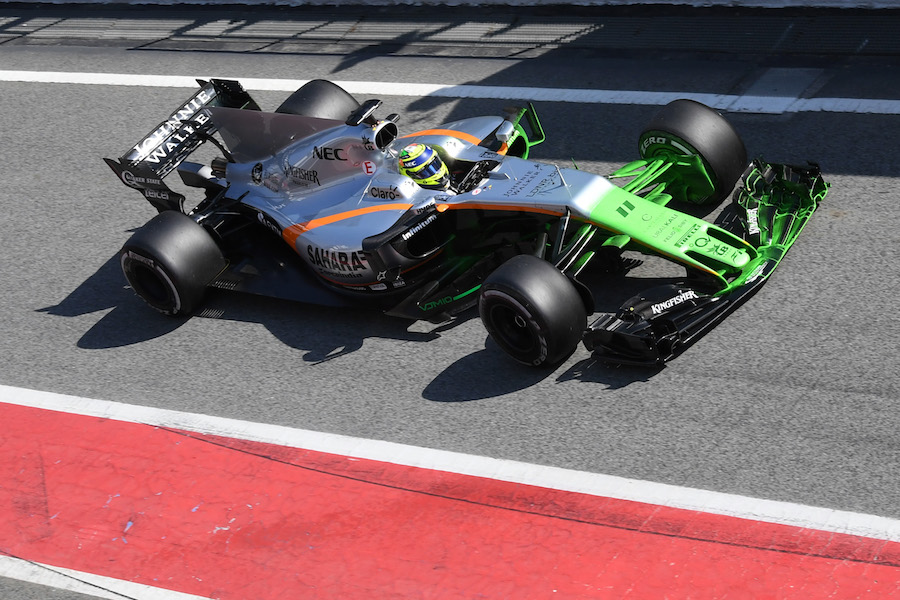 Sergio Perez leaves the pit lane with aero paint on nose and front wing