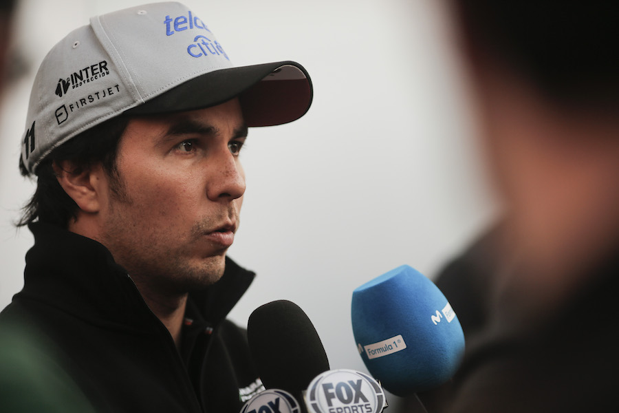 Sergio Perez answers questions from media