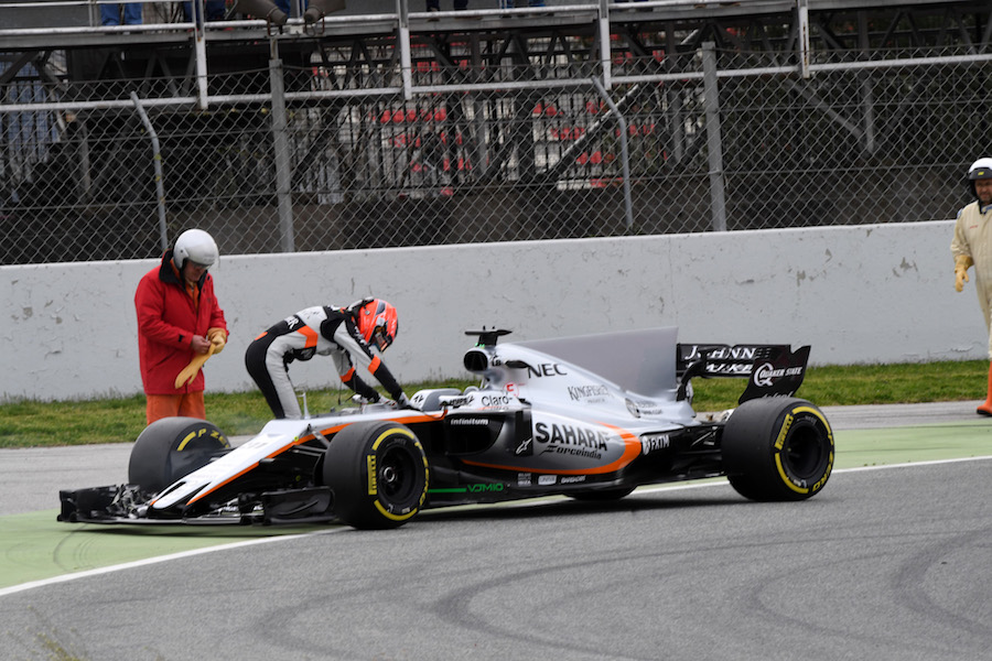 Esteban Ocon stops his Force India VJM10 on track