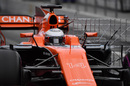 Fernando Alonso leaves the garage with aero sensor