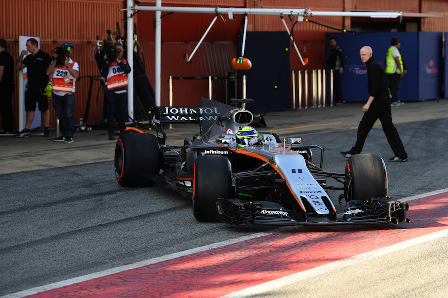 Sergio Perez leaves the garage for his run