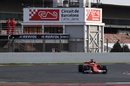 Sebastian Vettel at speed in the Ferrari SF70-H
