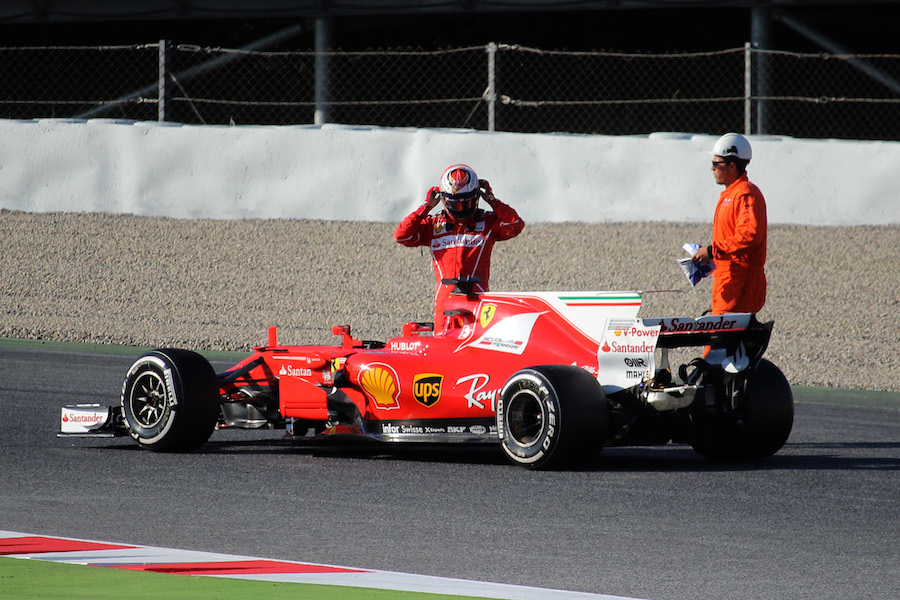 Kimi Raikkonen stops his Ferrari on track