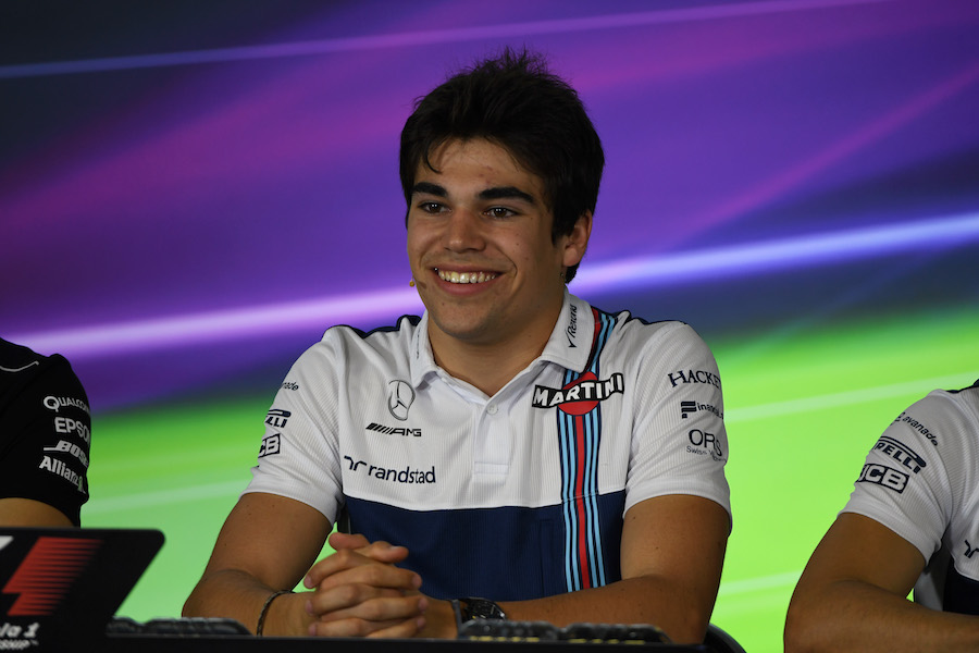 Lance Stroll answers a question from media in the press conference