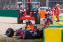 Daniel Ricciardo leaves his car after crashed in Q3