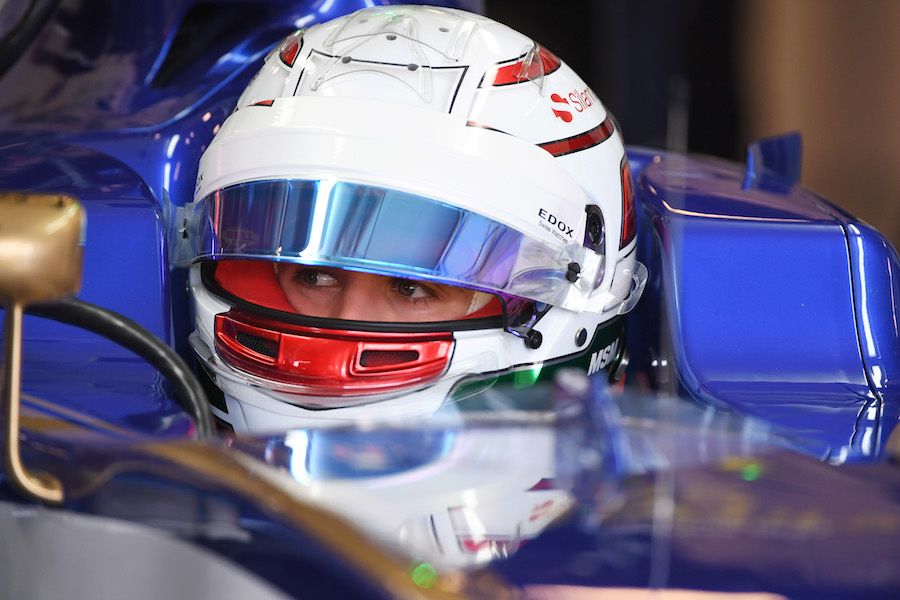 Antonio Giovinazzi sits in the cockpit of the Sauber