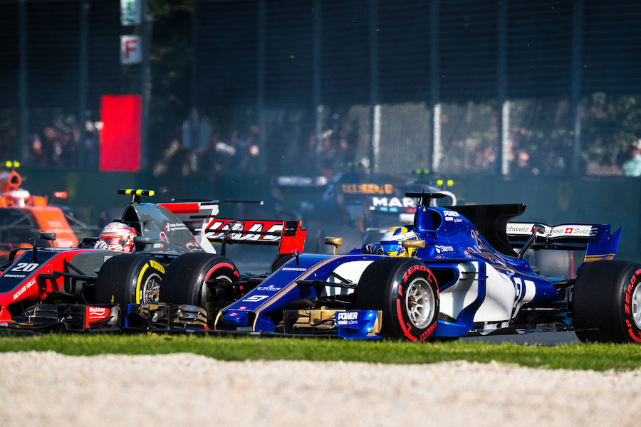 Marcus Ericsson battles for a positon with Kevin Magnussen