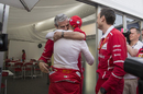 Maurizio Arrivabene and Sebastian Vettel hug after the race