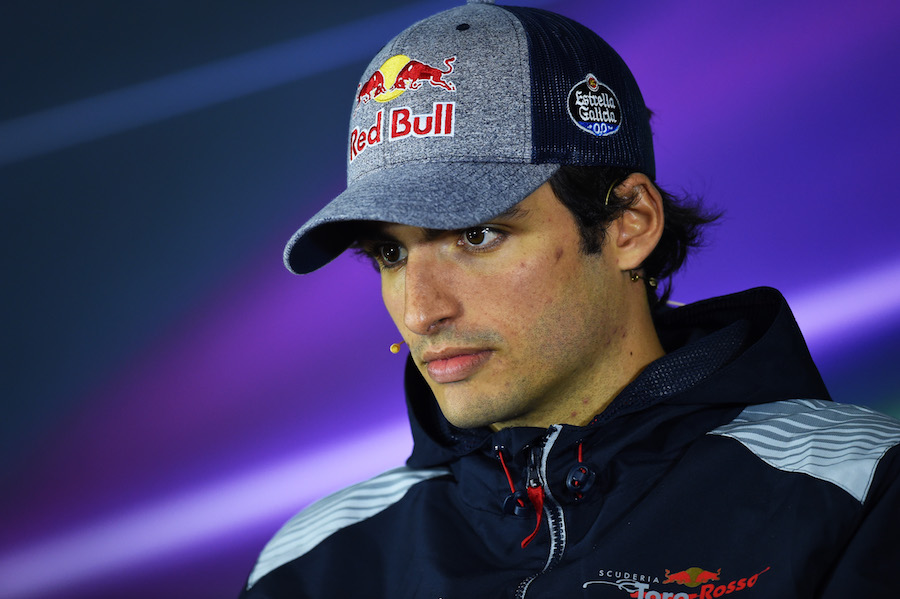 Carlos Sainz looks on in the press conference