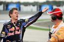 Sebastian Vettel angrily gesticulates after his collision with Mark Webber