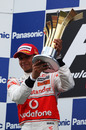 Lewis Hamilton with another very large trophy after his win at the Turkish Grand Prix