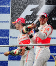 The champagne flies after the McLaren 1-2
