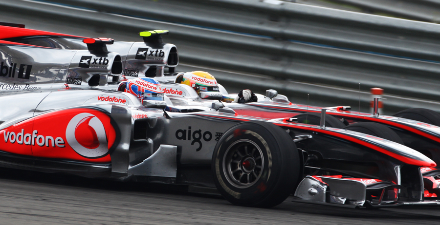 Jenson Button and Lewis Hamilton battle it out - '