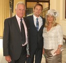 Jenson Button with his parents John and Simone at Buckingham Palace before receiving his MBE from the Queen