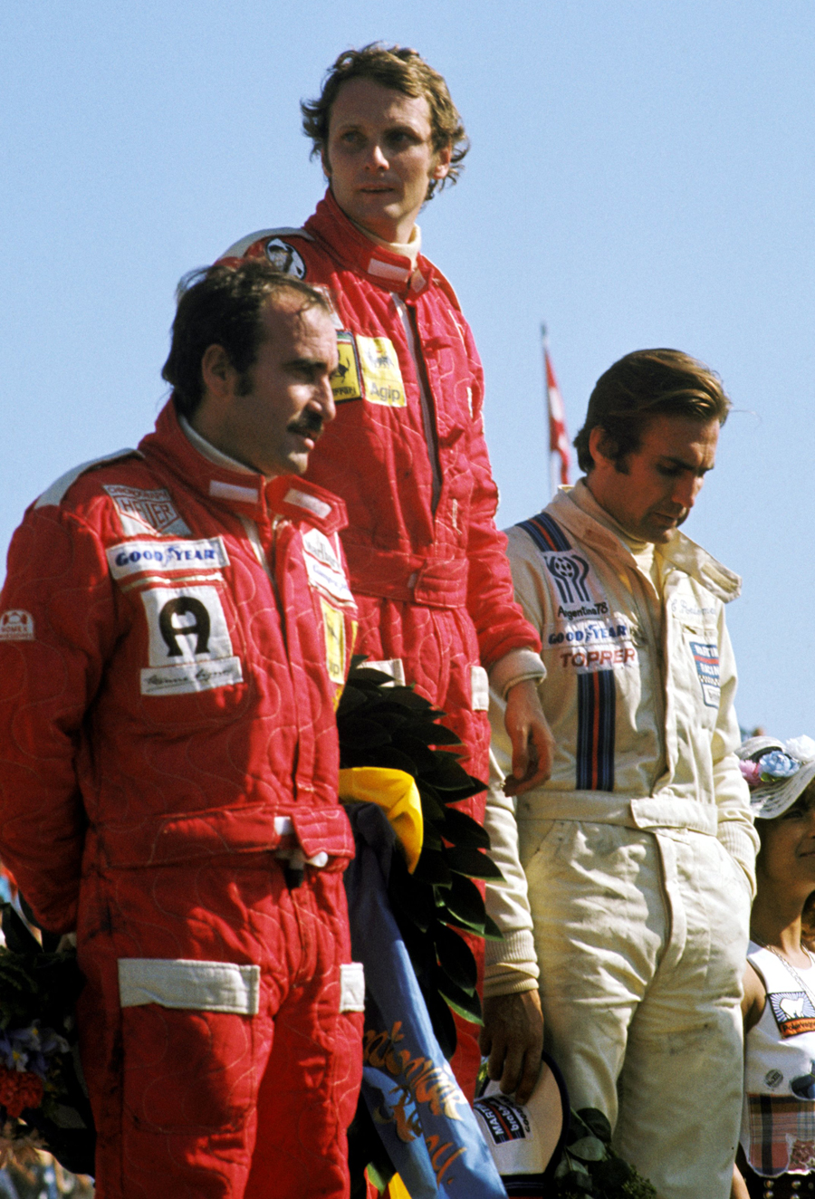 The podium at the Swedish Grand Prix - Clay Regazzoni, who finished third, race winner Niki Lauda and second-placed Carlos Reutemann