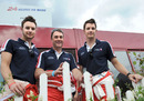 Nigel Mansell poses for a photo with his sons Greg and Leo