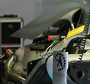 The exposed rear end of the Mercedes