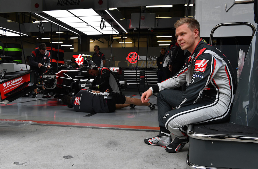 Kevin Magnussen waits the session start in the garage