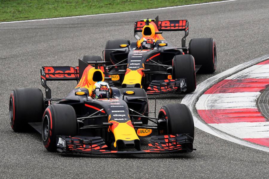 Daniel Ricciardo and Max Verstappen battle for a position
