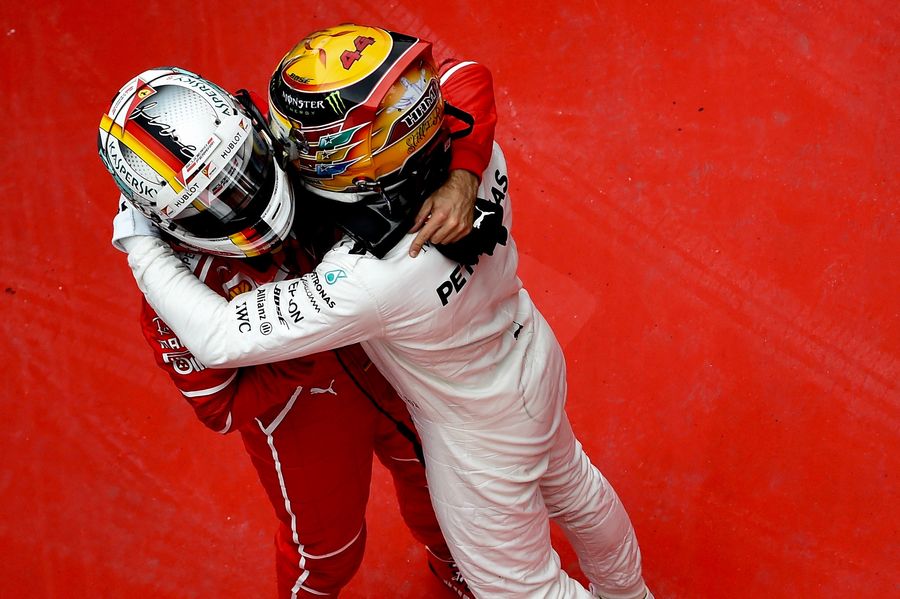Lewis Hamilton and Sebastian Vettel celebrates in parc ferme