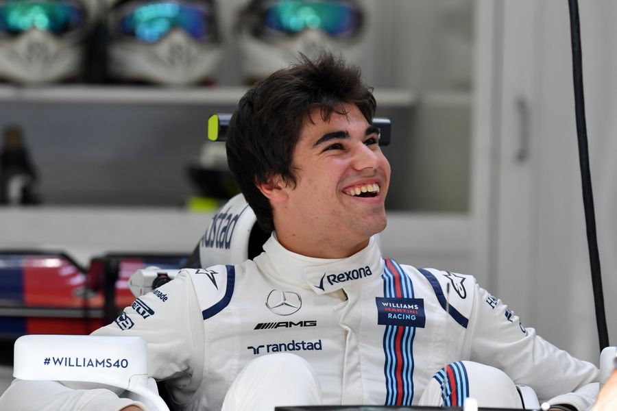Lance Stroll sits in his cockpit
