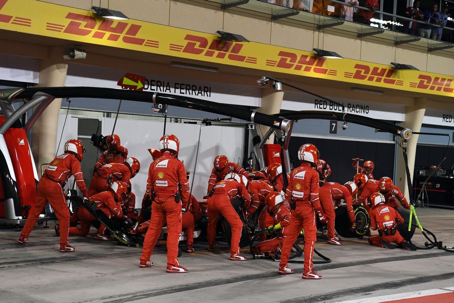 Sebastian Vettel makes a pit stop during the Race
