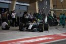 Lewis Hamilton leaves the pit