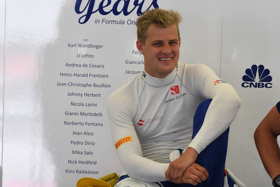 Marcus Ericsson relaxes in the garage