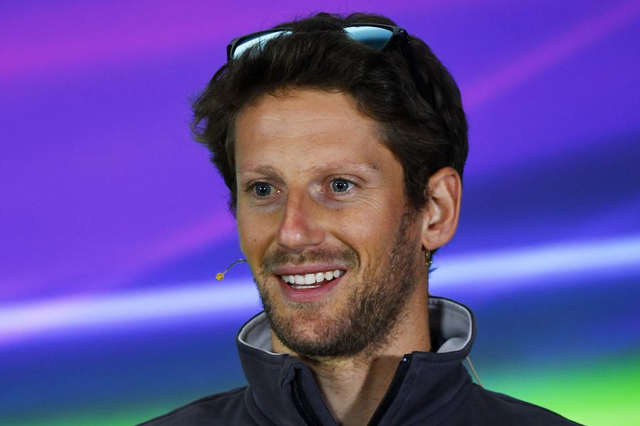 Romain Grosjean talks with the media