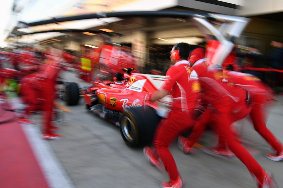 Ferrari mechanics make a practice pitstop