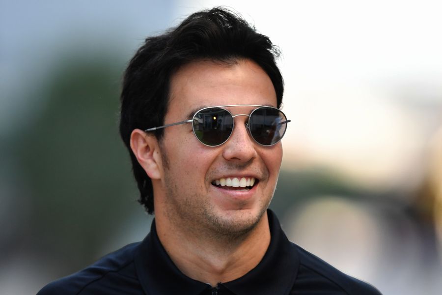 Sergio Perez looks relaxed in the paddock