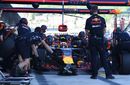 Daniel Ricciardo makes a pit stop during the FP2