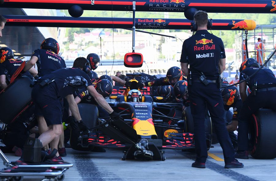 Daniel Ricciardo makes a pit stop during the FP2