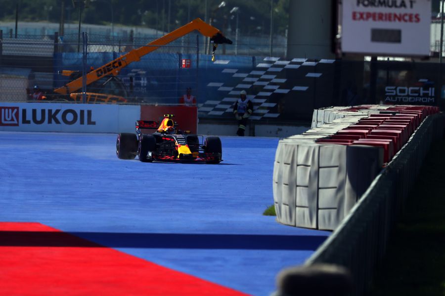 Max Verstappen runs wide in the Red Bull