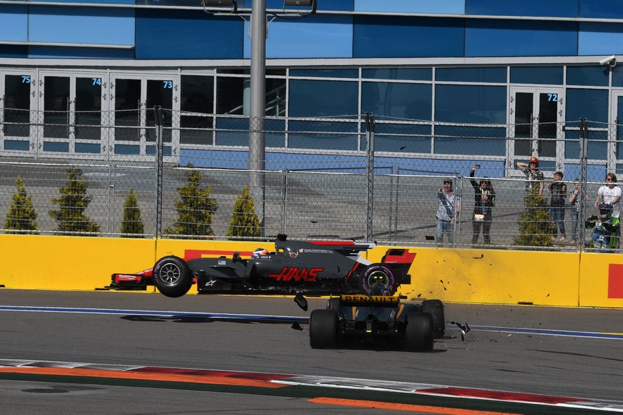 Romain Grosjean and Jolyon Palmer crash on lap one