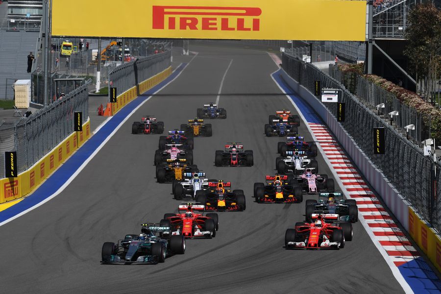 Valtteri Bottas leads Sebastian Vettel in the start of race