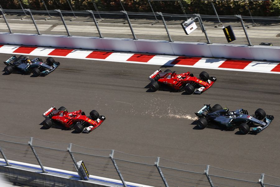 Valtteri Bottas leads Sebastian Vettel and Kimi Raikkonen at the start of the race