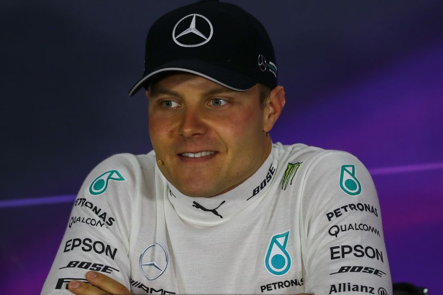 Valtteri Bottas relaxes in the press conference