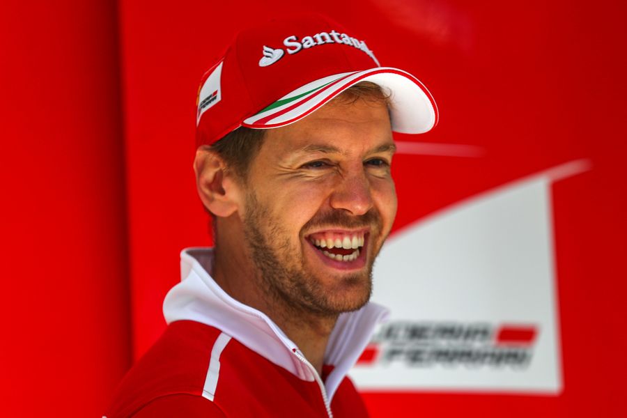 Sebastian Vettel looks relaxed in the garage