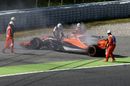 Fernando Alonso stops on track in FP1