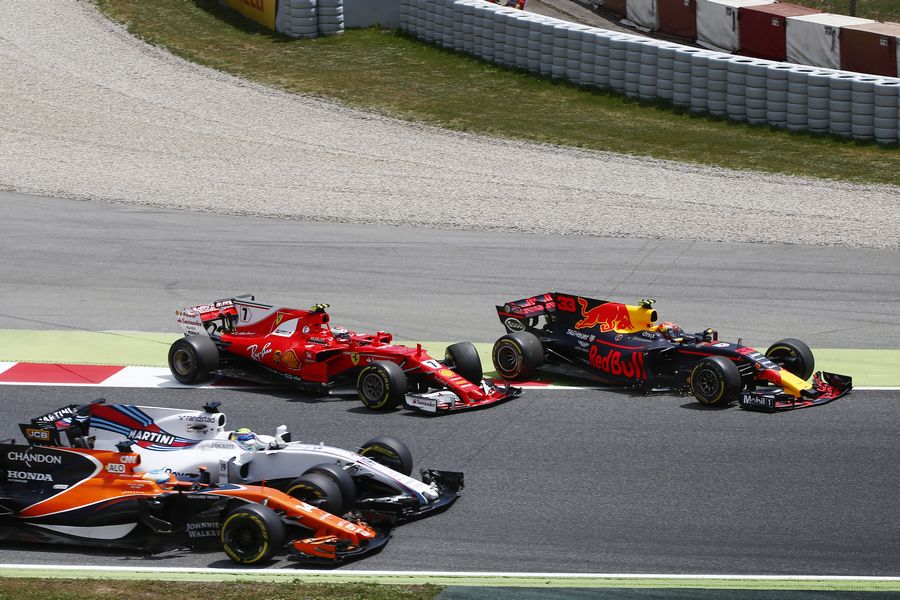 Kimi Raikkonen and Max Verstappen collide on lap one