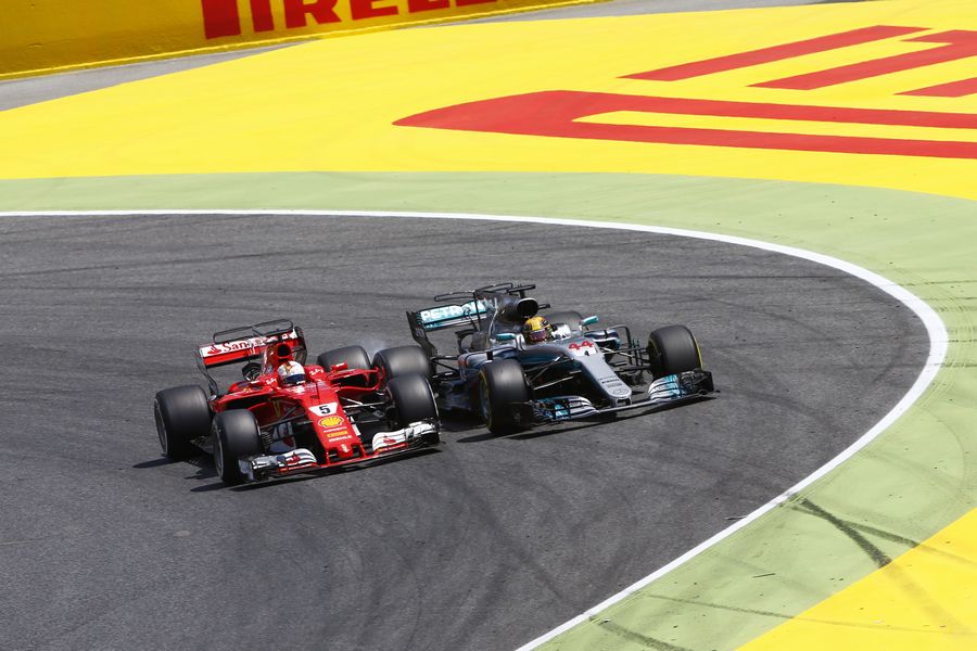 Sebastian Vettel and Lewis Hamilton side by side