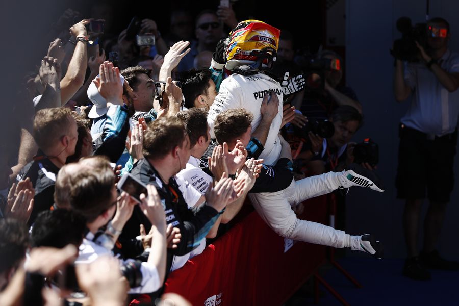 Lewis Hamilton cerebrates with Mercedes