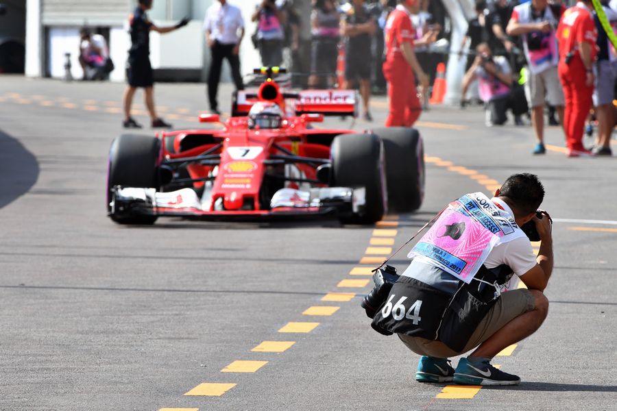 Kimi Raikkonen pulls out of the Ferrari garage