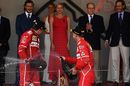 Kimi Raikkonen and Sebastian Vettel on the podium with the champagne
